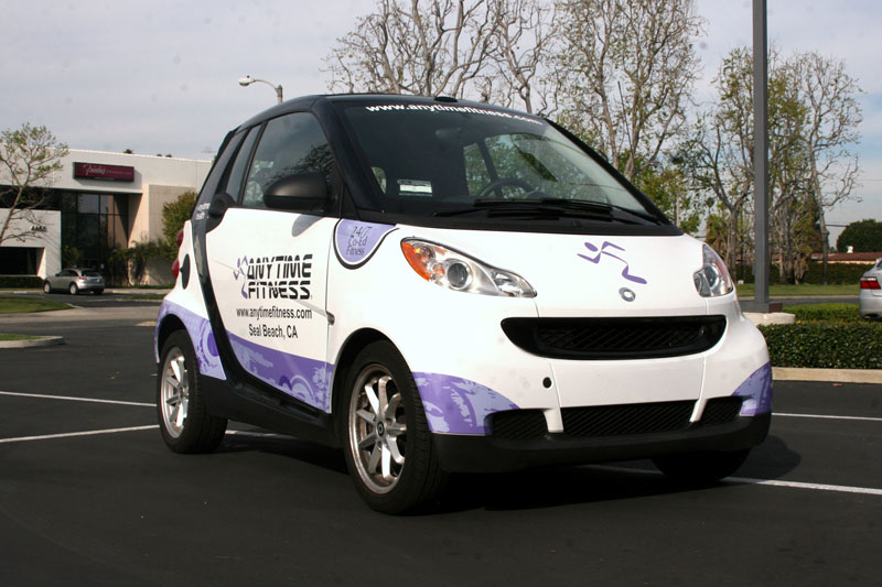 2 vehiclewrap smartcar anytimefitness iconography